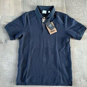 Burberry Oxford polo iconic piece in royal blue color.